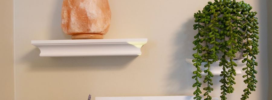 Relax shelf with salt lamp and plants